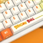Close-up of a premium Dragon Ball PBT backlit keycap set, showcasing vibrant character art and side-engraved legends for ultimate nostalgia.