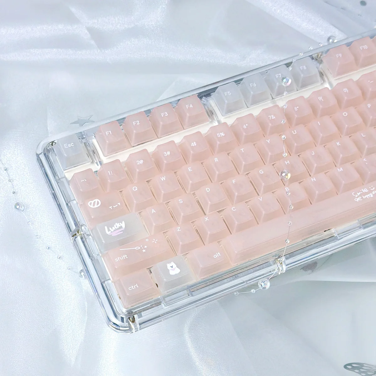 Detailed views of the Dreamy Star Glitter PC Keycap Set, highlighting its frosted translucent diary aesthetic with shimmering stars and soft pastel hues.