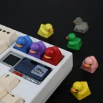 Multiple views of Stress Relief Duck Keycaps in vibrant design, showcasing its playful charm and tactile stress relief design for your keyboard.