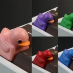 Stress Relief Duck Keycaps, designed for tactile stress relief, showcasing vibrant colors and playful charm on a keyboard.