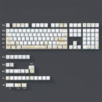 Elegant embroidered PBT keycaps set are beautifully displayed from a unique angle, highlighting their intricate white patterns and luxurious refined design.