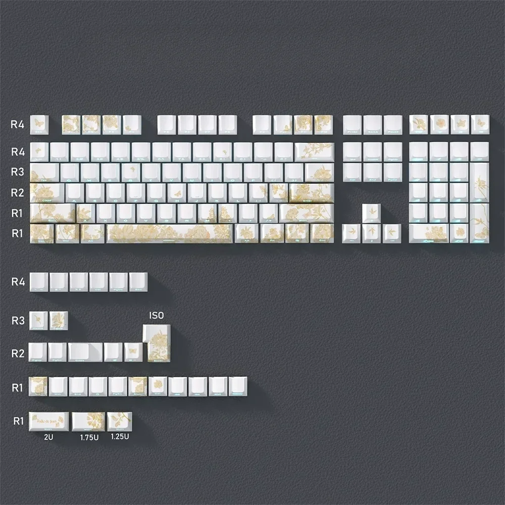 Elegant embroidered PBT keycaps set are beautifully displayed from a unique angle, highlighting their intricate white patterns and luxurious refined design.