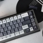 Emo Kitten PBT Keycap Set: detailed view from new angle, highlighting whimsical, expressive feline characters and durable PBT finish.