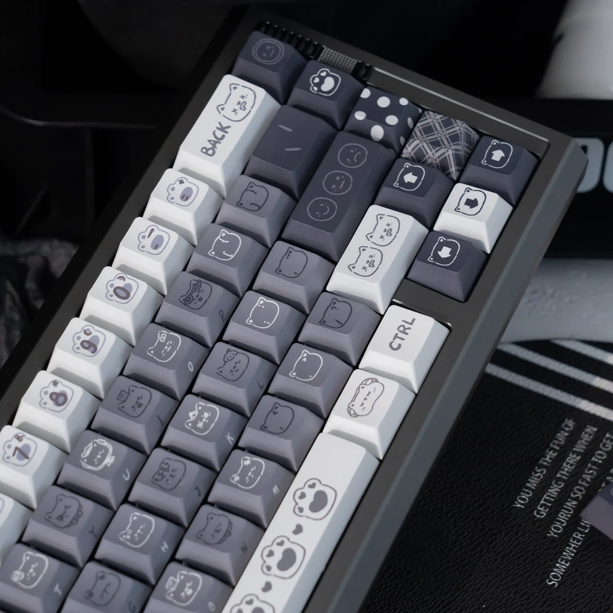 Unique Emo Kitten PBT Keycap Set viewed from various angles, showcasing whimsical expressive feline characters and the soft, durable PBT finish.