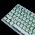 Ethereal Refraction Translucent PBT Keycaps set showcasing intricate hollow legends and stunning light refraction from multiple artistic angles.