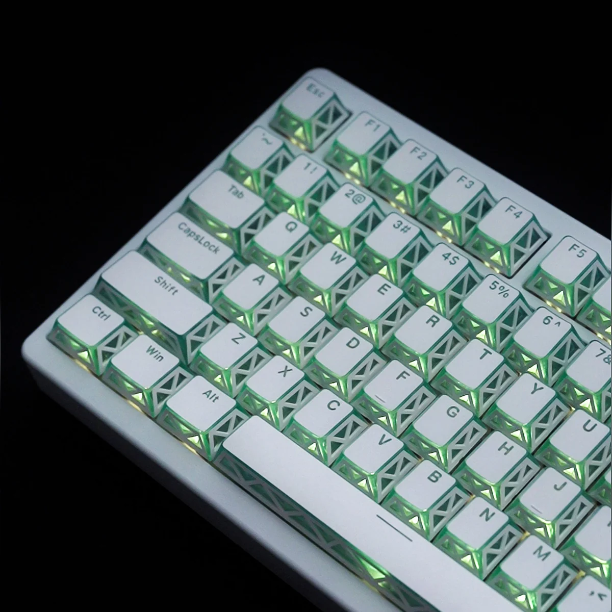 Ethereal Refraction Translucent PBT Keycaps set showcasing intricate hollow legends and stunning light refraction from multiple artistic angles.