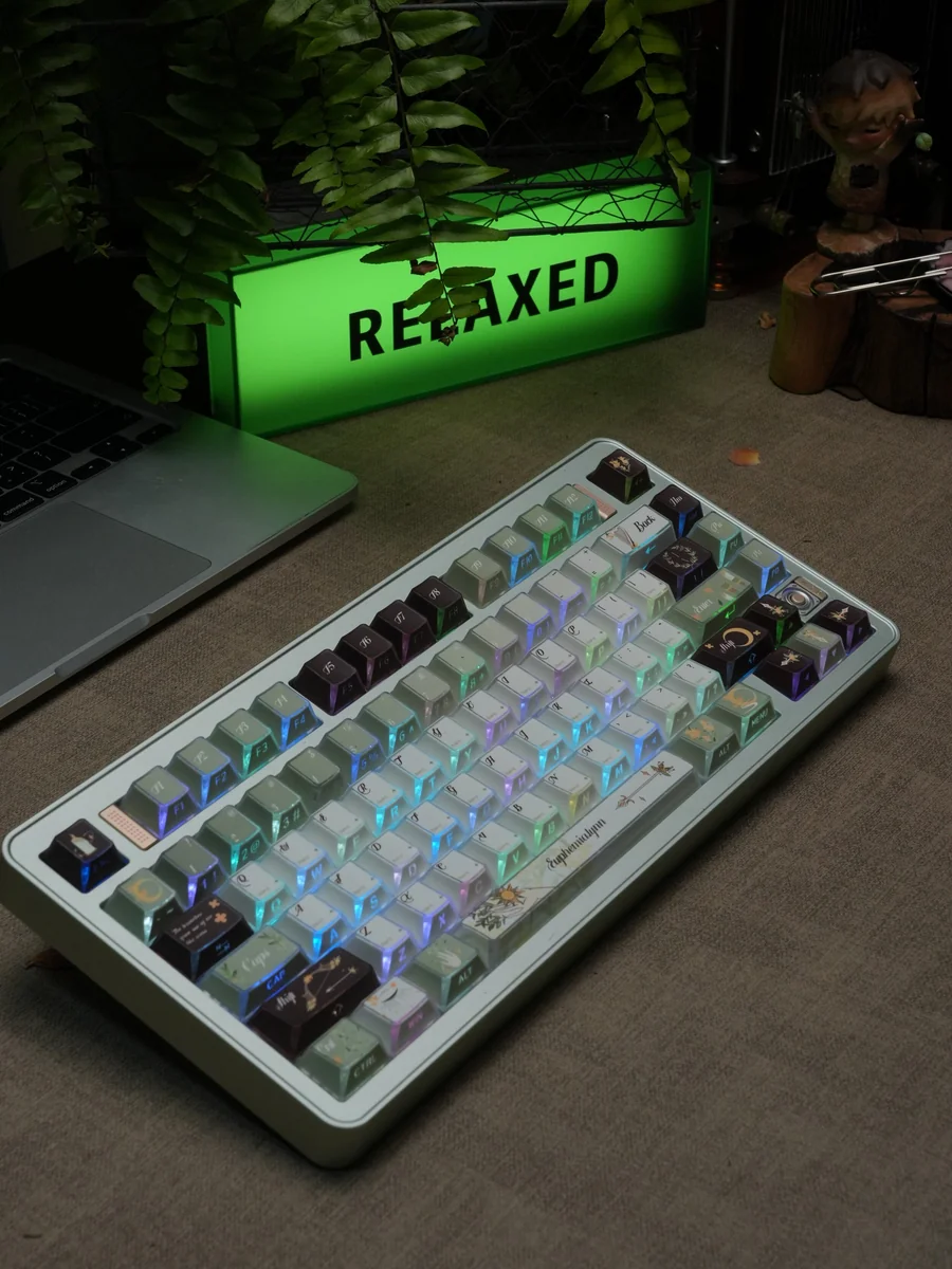 Euphemialynn PBT dye-sub keycaps set, revealing a captivating refracted light effect and ethereal laurel motifs, embodying serene classical elegant design.