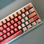 Evangelion Keycap Set: exclusive Asuka & EVA Unit-02 design from multiple artistic angles, emphasizing vibrant red, orange, and striking metallic finish.