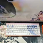 Artistic close-ups of the Rei Ayanami Evangelion PBT keycaps set from various angles, highlighting the iconic anime theme.
