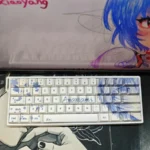 Artistic Rei Ayanami Evangelion PBT keycaps set, featuring crisp front-printed legends in iconic anime design. Opaque finish captures the anime theme.