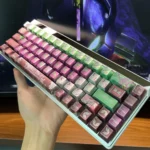 Explore the striking Evangelion Unit-01 metallic dye-sub keycaps set, showcasing its iconic mecha aesthetic from multiple premium angle.