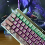 Premium Evangelion Unit-01 Metallic Dye-Sub Keycaps set displayed from various angles, showcasing the iconic mecha aesthetic.