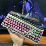 Close-up views of the premium Evangelion Unit-01 metallic dye-sub keycaps set, showcasing vibrant mecha aesthetics and intricate details.