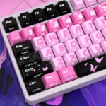 Experience the Valorant Clove side-lit PBT keycaps set from multiple angles, revealing their mystical dark hues, durable PBT construction, and ethereal setup.