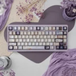 Dreamy Pearlescent Floral PBT Keycap Set main image. Features delicate dye-sub floral patterns and a soft, ethereal pearlescent sheen, creating an artistic design.