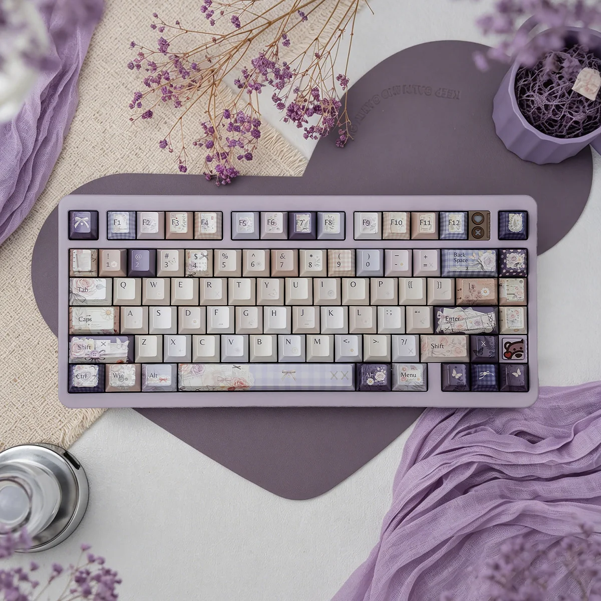 Dreamy Pearlescent Floral PBT Keycap Set main image. Features delicate dye-sub floral patterns and a soft, ethereal pearlescent sheen, creating an artistic design.