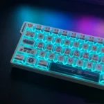 An angled view of the Folded Shadow Odyssey pixel art keycaps set, highlighting the unique, otherworldly retro designs and the premium PBT dye-sublimation.
