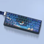 Gengar Starry Sky Side-Lit Keycap Set. Translucent, side-engraved Gengar design with vibrant cosmic legends. Playful keycaps from different angles.