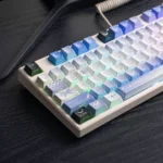 Exclusive Genshin Impact Columbina PBT keycaps set, showcasing ethereal character art and celestial moon aesthetics from a striking angle.