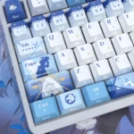 Detailed shot of Genshin Impact Furina Side-Engraved Translucent PBT Keycaps set, highlighting the elegant hydro theme and vibrant legends from an angle.