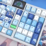Premium Genshin Impact Furina side-engraved PBT keycaps set displayed from various angles, highlighting their elegant hydro theme and vibrant translucent setup.