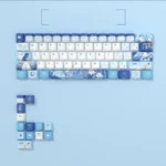 Genshin Impact Furina side-engraved translucent PBT keycaps set, viewed from an elegant angle, revealing vibrant hydro-themed legends and premium detail.