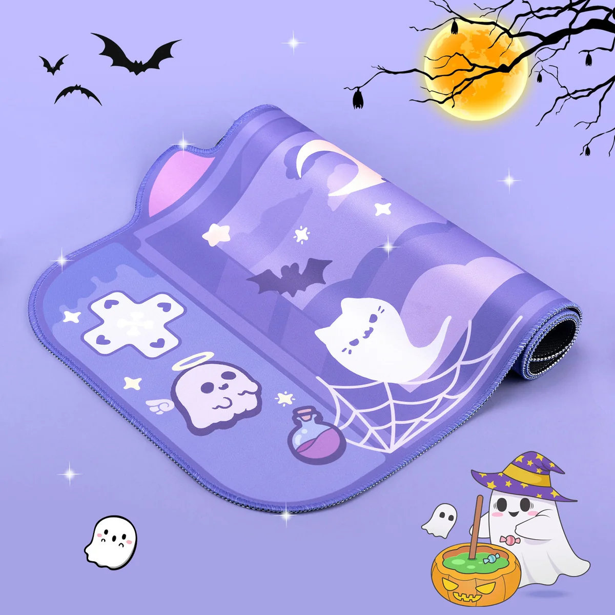 Side view of the oversized playful ghost desk mat and ergonomic wrist rest, showcasing the charming ghost pattern and subtle spooky aesthetic.