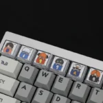 An artistic side view of the whimsical Gintama sleeping artisan resin keycaps set, revealing the intricate details and vibrant, glossy finish of these unique design.