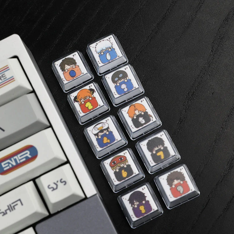 Whimsical Gintama sleeping artisan resin 10-keycap set. Detailed angle view shows vibrant colors, glossy finish, and peaceful slumbering characters.