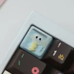 Handcrafted resin glitter Lightning Cloud keycap, dazzling with sparkling lightning and dreamy celestial clouds. An artistic, unique accessory.