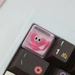 Playful Glitter Pink Heart Keycap gallery, showcasing the whimsical handcrafted resin art from various angles, sparkling with charming pink hearts.