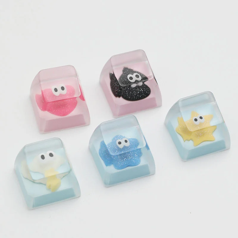 Handcrafted glitter Little Star keycaps, various angles. Whimsical, sparkling designs with unique celestial elements and cute accents, highlighting artistic design.
