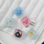 Handcrafted glitter Little Star keycaps shown from multiple angles, sparkling with whimsical celestial designs and vibrant accents, highlighting their unique design.