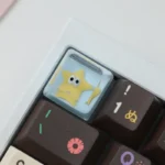 Handcrafted glitter Little Star keycaps, sparkling with whimsical celestial vibrant designs, shown from multiple angles to reveal unique artistry.