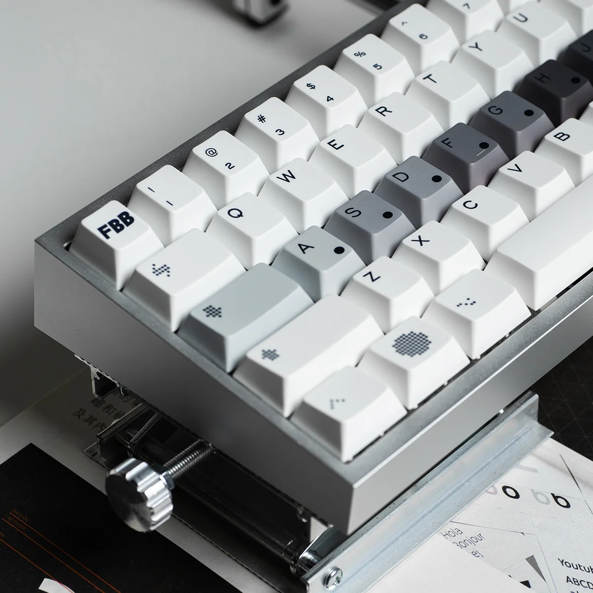 Detailed shot of OPXY White Cherry Keycap Set, showcasing the striking fluid monochromatic design and premium feel perfect for mechanical keyboard.