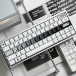 OPXY White Cherry Keycap Set displayed, showcasing a modern monochromatic blend for a sophisticated keyboard aesthetic.
