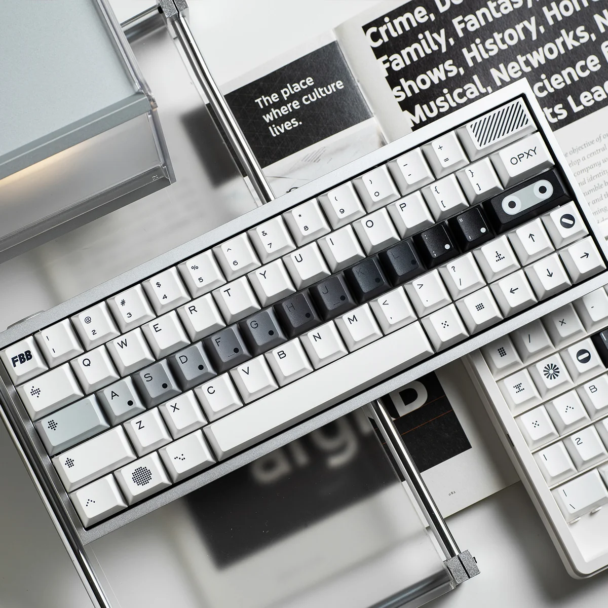 OPXY White Cherry Keycap Set displayed, showcasing a modern monochromatic blend for a sophisticated keyboard aesthetic.