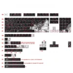 Urban Graffiti PBT Keycaps Set. Durable black PBT keys with vibrant street art, shown from a unique angle, perfect for custom keyboards.