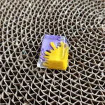 Vibrant handcrafted graffiti resin keycap, captured from multiple dynamic angles, highlighting its unique abstract splatter art design and bold design.