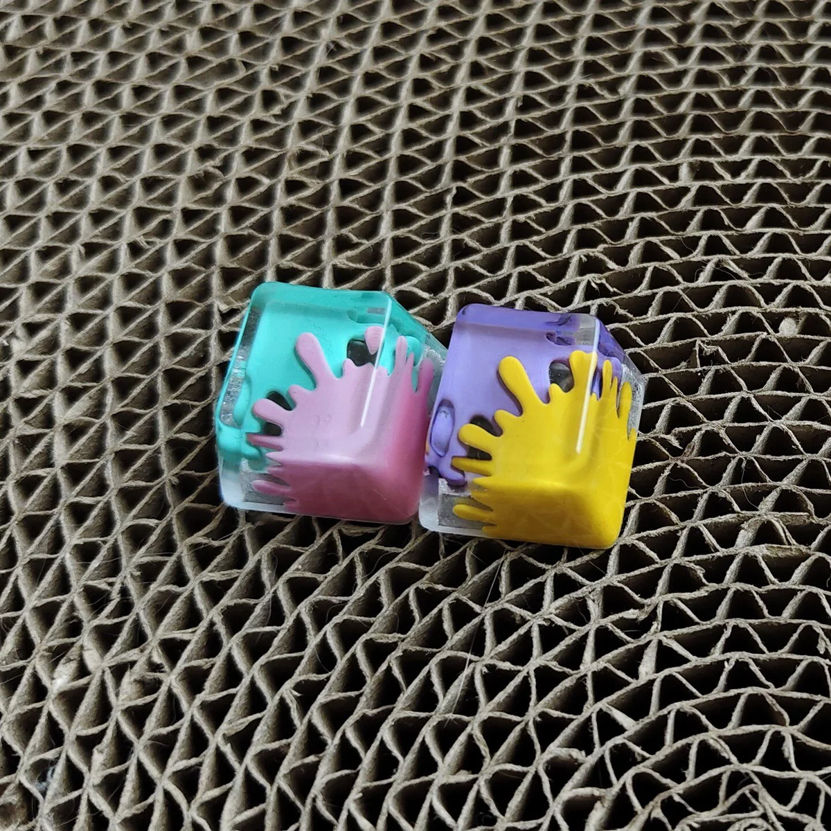 Vibrant handcrafted graffiti resin ESC keycap featuring dynamic splatter art in bold, contrasting colors, perfect for custom mechanical keyboards.