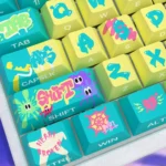 Vibrant Graffiti Splatter Side-Print PBT RGB Keycap Set, captured from various angles, highlighting dynamic art and crisp legends for an artistic keyboard.