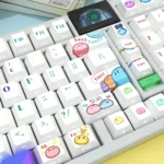 Full set of Great Dango Family Keycap Set, showcasing the adorable Dango family characters in a soft, anime-inspired glow from multiple angle.
