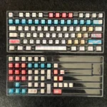 Iconic RX-78-2 Gundam metallic-finish keycap set displayed from various angles, highlighting its premium mecha aesthetic and intricate details. Essential design.
