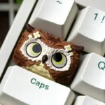 Detailed view of the unique handcrafted resin owl artisan keycap, highlighting its enchanting forest design and meticulous resin craftsmanship for mechanical keyboard.