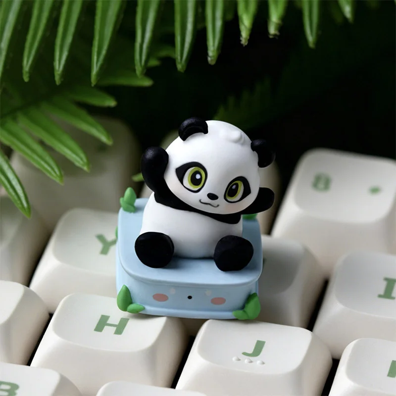 Handcrafted resin panda keycap, an adorable ESC charm. Multiple angles reveal intricate details, whimsical pose, and artistic craftsmanship.