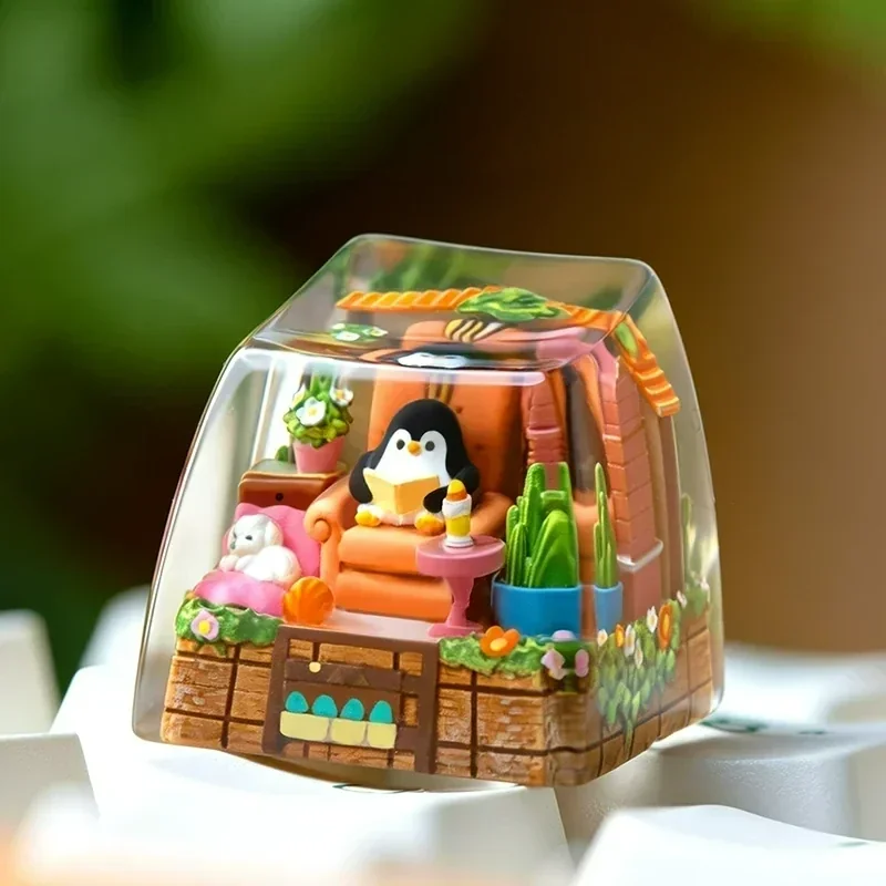 Whimsical handcrafted resin penguin keycap, an artisan ESC key showcasing a charming penguin with vibrant arctic colors and glossy finish.