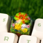 Handcrafted epoxy resin succulent keycap for ESC, featuring a vibrant miniature succulent plant encapsulated in clear resin, adding artistic natural design.