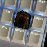 A collection of handcrafted Cosmic Dread Cthulhu resin artisan keycaps from various angles, showcasing intricate Lovecraftian horror details and dark accent.