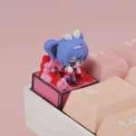 Vibrant Hatsune Miku artisan ESC keycap from a side view, highlighting the intricate craftsmanship and playful pop-culture design for mechanical keyboard.