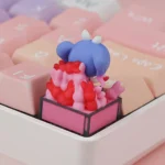 Explore various angles of the exclusive Hatsune Miku artisan ESC keycap, highlighting its vibrant, playful design and intricate pop-culture.